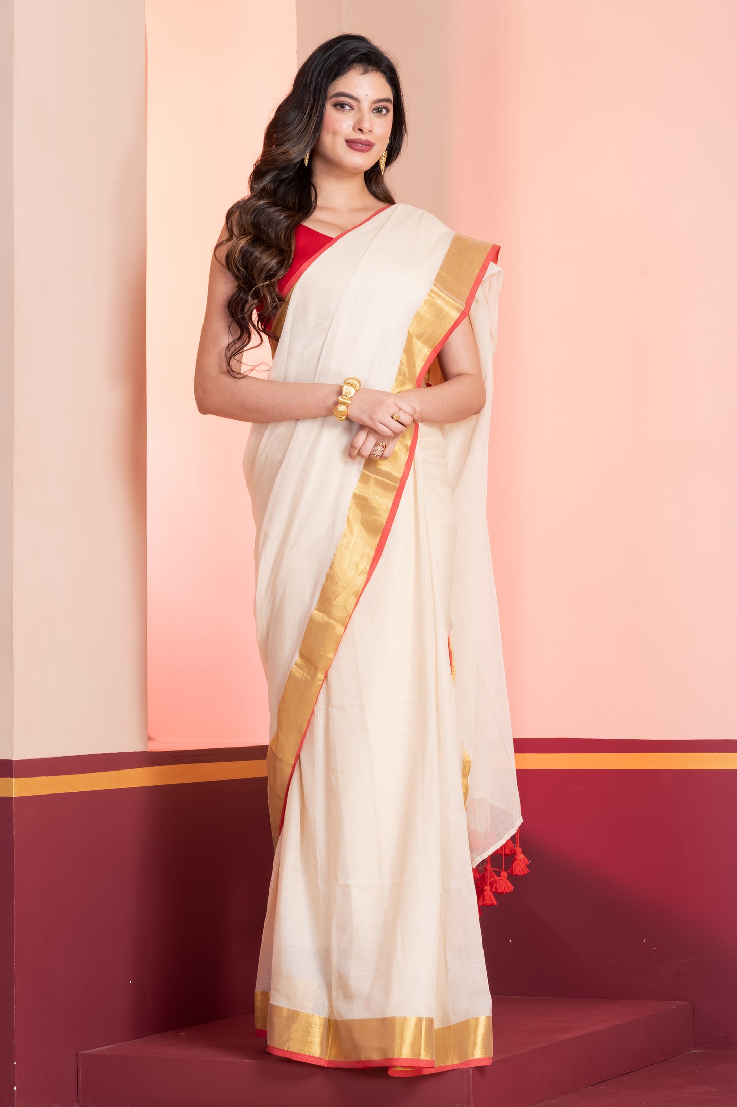 Cream and Red Handloom Mul Cotton Saree with Zari and Tassels