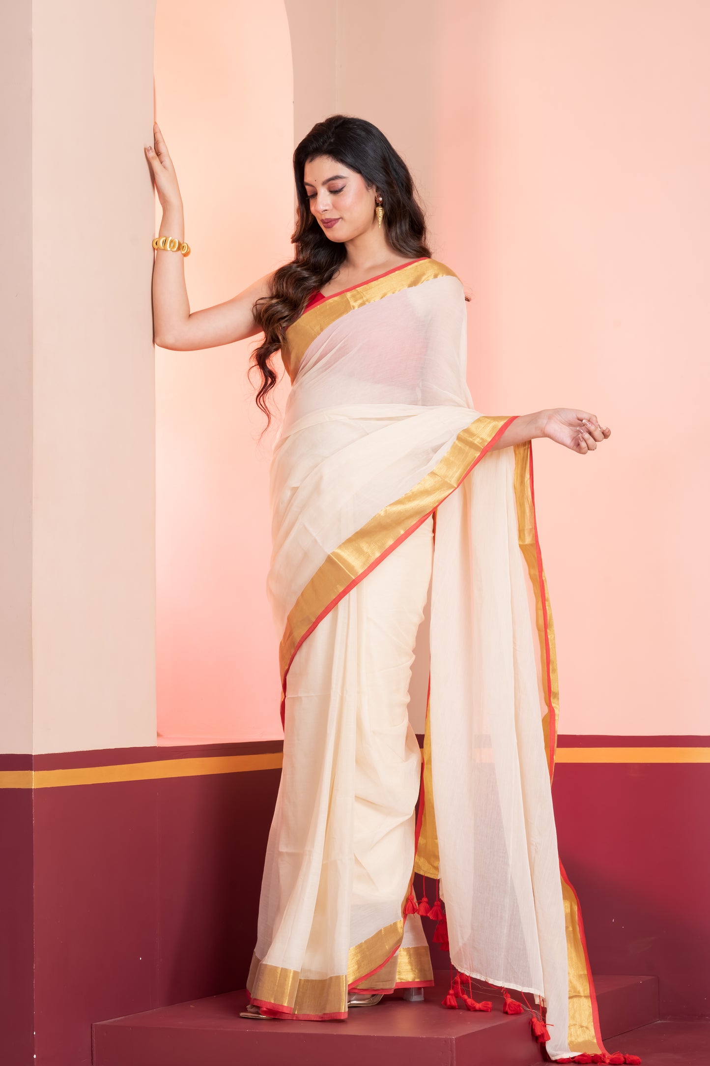Cream and Red Handloom Mul Cotton Saree with Zari and Tassels