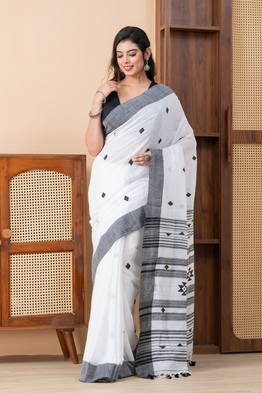 White Khadi Cotton Saree with Heavy Embroidered Palla and Tassels