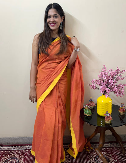 Orange Solid Khadi Cotton Saree with Yellow Border and Tassels Saree Handloom saree, handcrafted saree, daily wear saree, office saree, affordable saree, saree for summers, Suta sarees, Eternity by Sakshi Sarees,