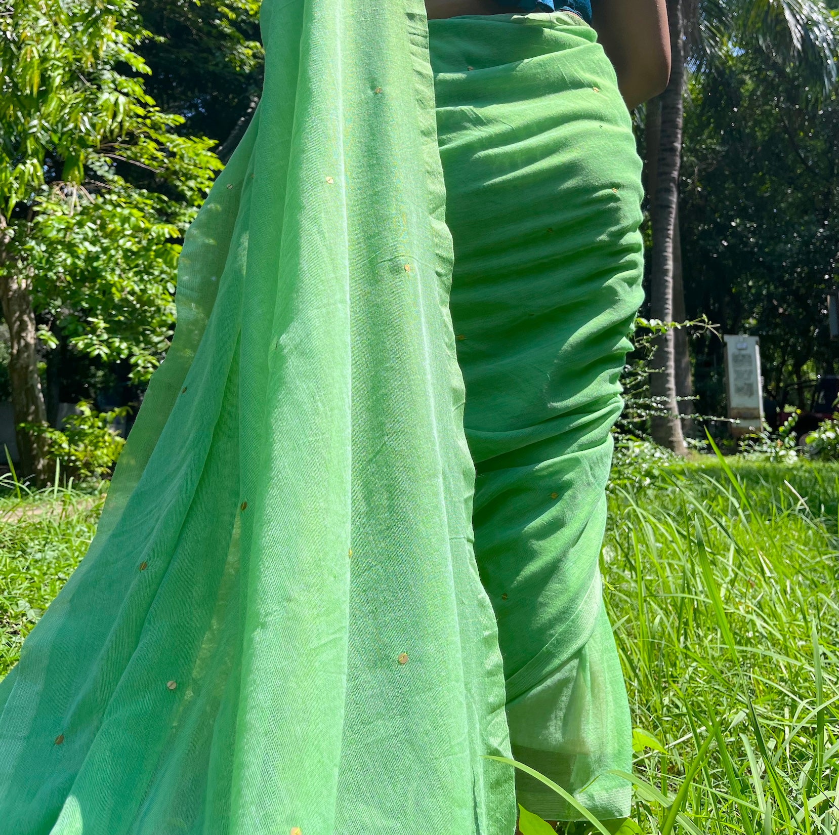 Green Mul Cotton Saree with All Over Golden Sequence & Tassels Saree Handloom saree, handcrafted saree, daily wear saree, office saree, affordable saree, saree for summers, Suta sarees, Eternity by Sakshi Sarees,