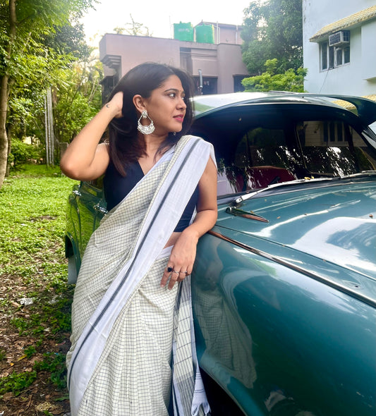 Off White Mul Cotton Saree with Black Checks All Over Saree Handloom saree, handcrafted saree, daily wear saree, office saree, affordable saree, saree for summers, Suta sarees, Eternity by Sakshi Sarees,